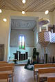 Der Altar wurde gebildet aus Brandbalken des Dachstuhls an der Stelle, wo früher die Orgel stand!