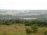 Blick vomSüdhang des Ettersberges (Naturschutzgebiet) auf die ausufernde Stadt mit dem "Abfüllbetrieb Coca Cola Weimar"